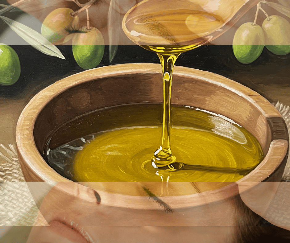 Pure olive oil being poured into a wooden bowl, surrounded by fresh olives and herbs. Authentic natural skincare at Salon 2 Go.